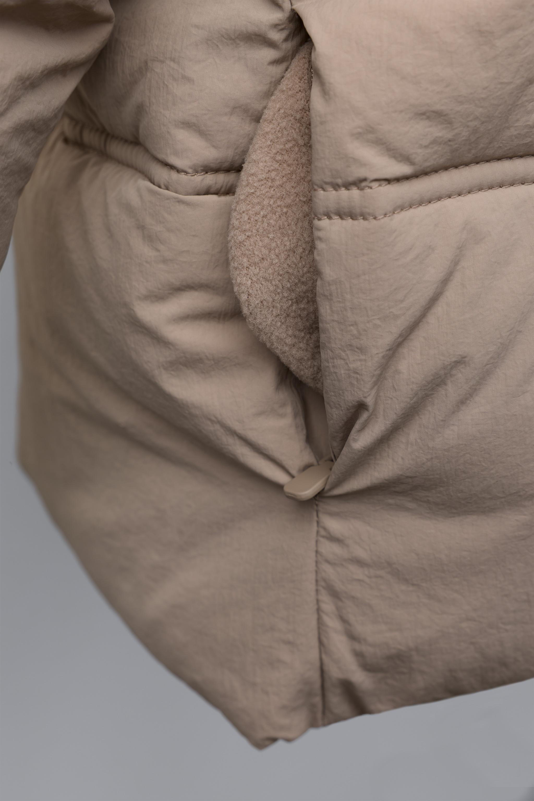 MANTEAU MATELASSÉ À CAPUCHE DÉPERLANT